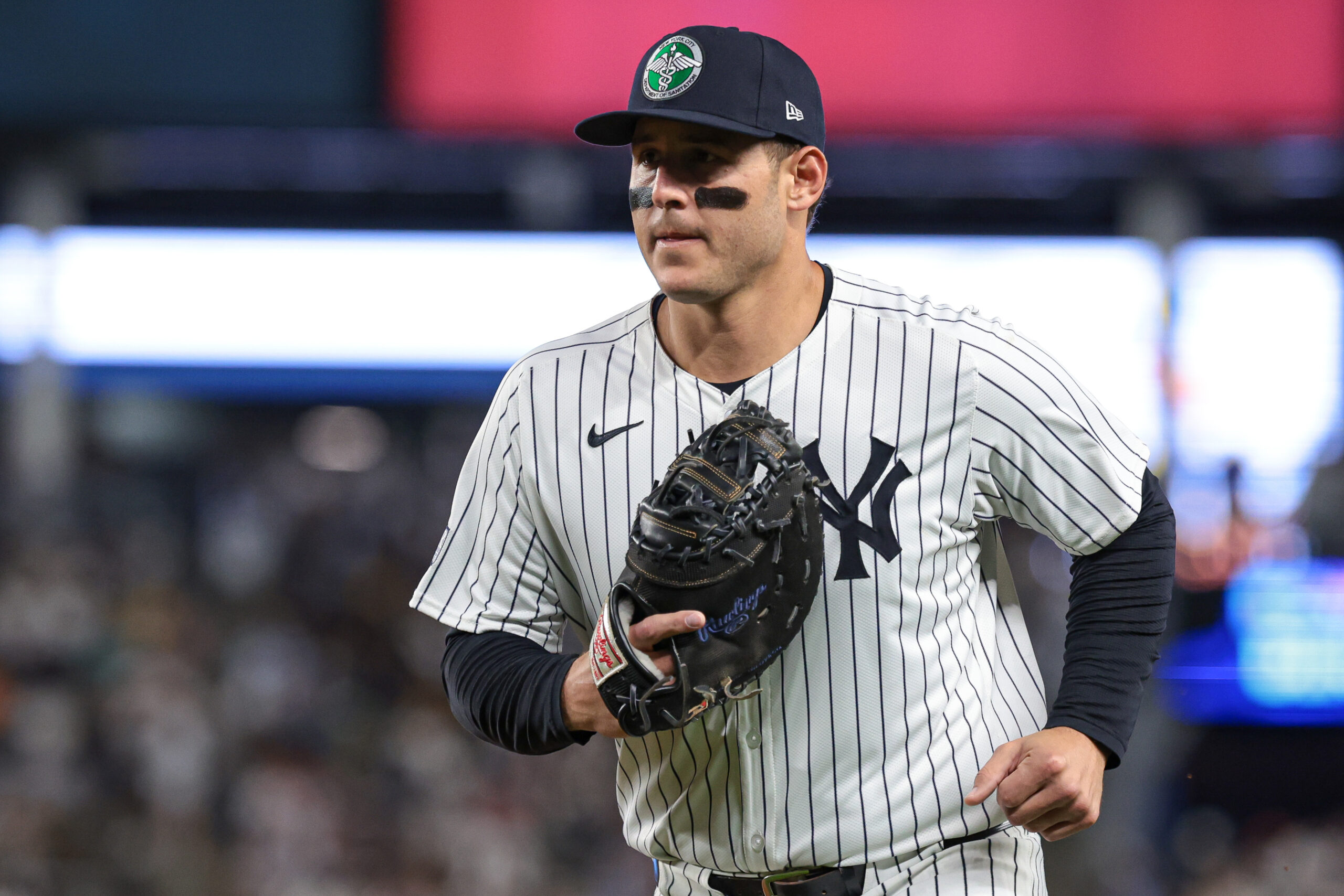 Sep 11, 2024; Bronx, New York, USA; New York Yankees first baseman Anthony Rizzo (48) runs in at the end of the top of the third inning against the Kansas City Royals at Yankee Stadium. Mandatory Credit: Vincent Carchietta-Imagn Images