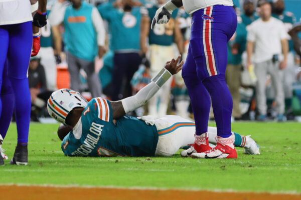 Sep 12, 2024; Miami Gardens, Florida, USA; Miami Dolphins quarterback Tua Tagovailoa (1) reacts after an apparent injury against the Buffalo Bills during the third quarter at Hard Rock Stadium. Mandatory Credit: Sam Navarro-Imagn Images