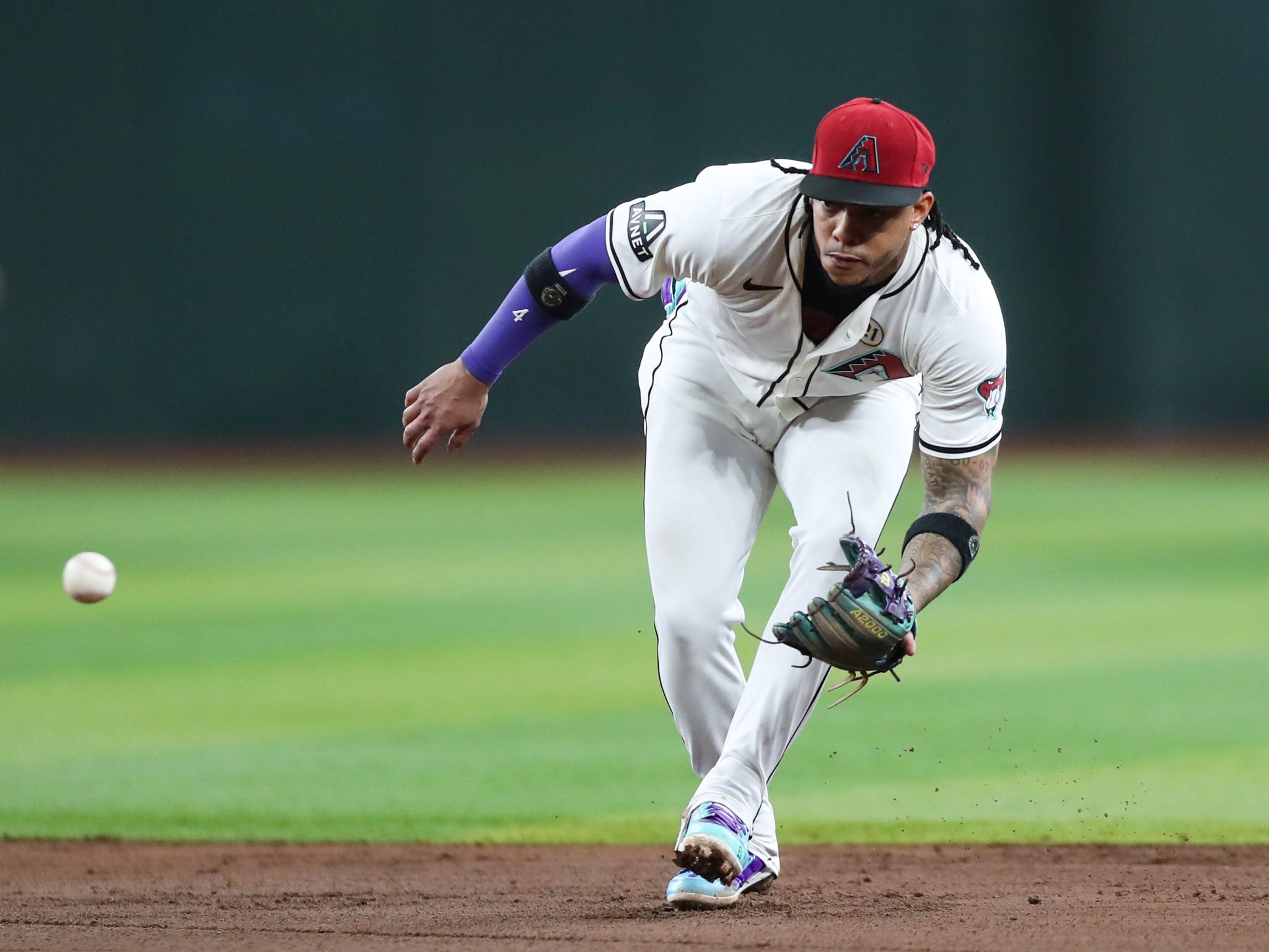 Arizona Diamondbacks second base Ketel Marte (4) fields a ground ball on Sept. 15, 2024 at Chase Field in Phoenix.