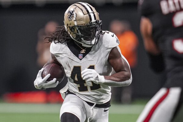 Sep 29, 2024; Atlanta, Georgia, USA; New Orleans Saints running back Alvin Kamara (41) runs against the Atlanta Falcons at Mercedes-Benz Stadium. Mandatory Credit: Dale Zanine-Imagn Images