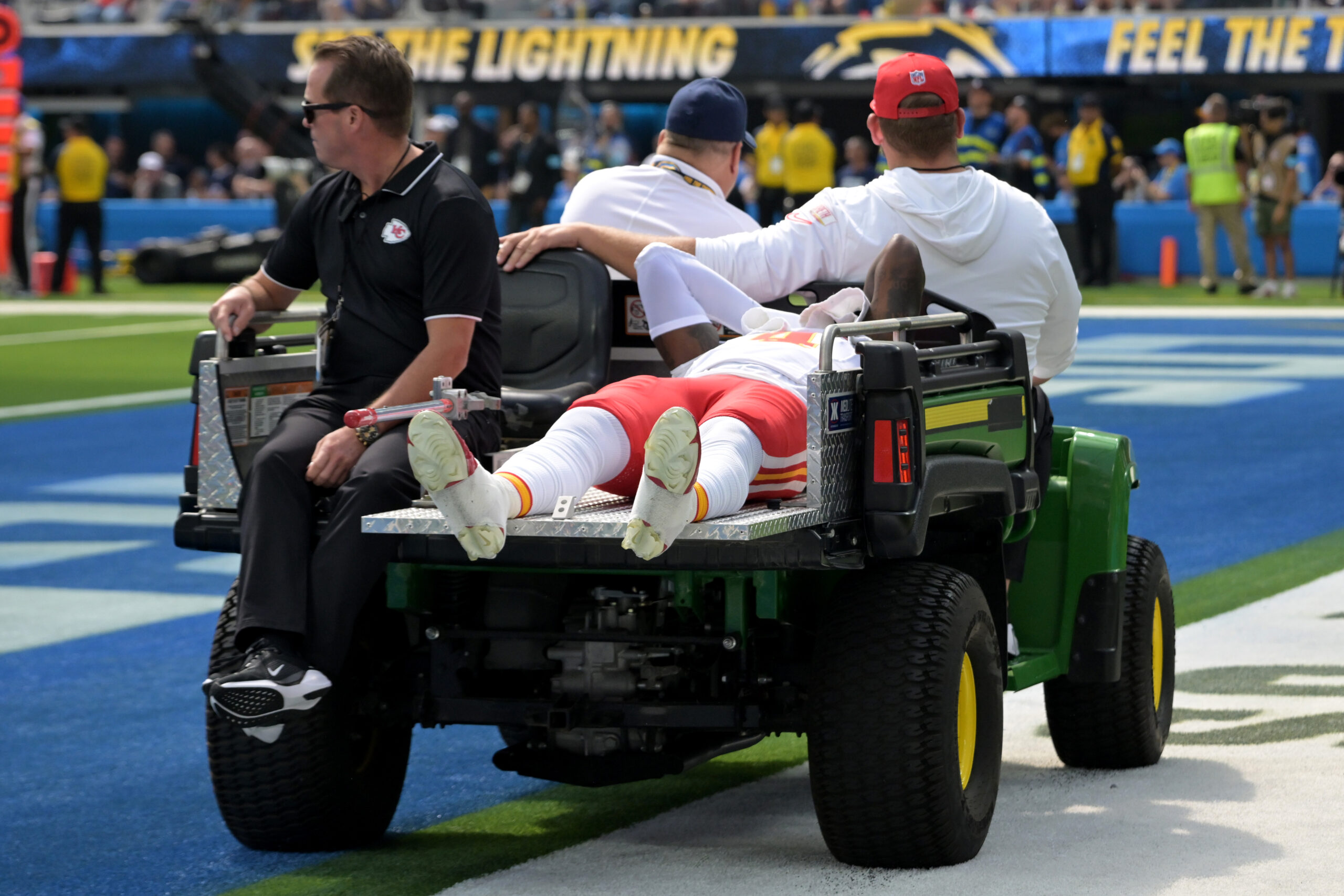 Sep 29, 2024; Inglewood, California, USA; Kansas City Chiefs wide receiver Rashee Rice (4) is carted off the field after an injury in the first half against the Los Angeles Chargers at SoFi Stadium.