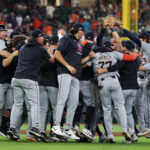 Oct 2, 2024; Houston, Texas, USA; Members of the Detroit Tigers celebrate after defeating the Houston Astros in game two of the Wildcard round for the 2024 MLB Playoffs at Minute Maid Park.