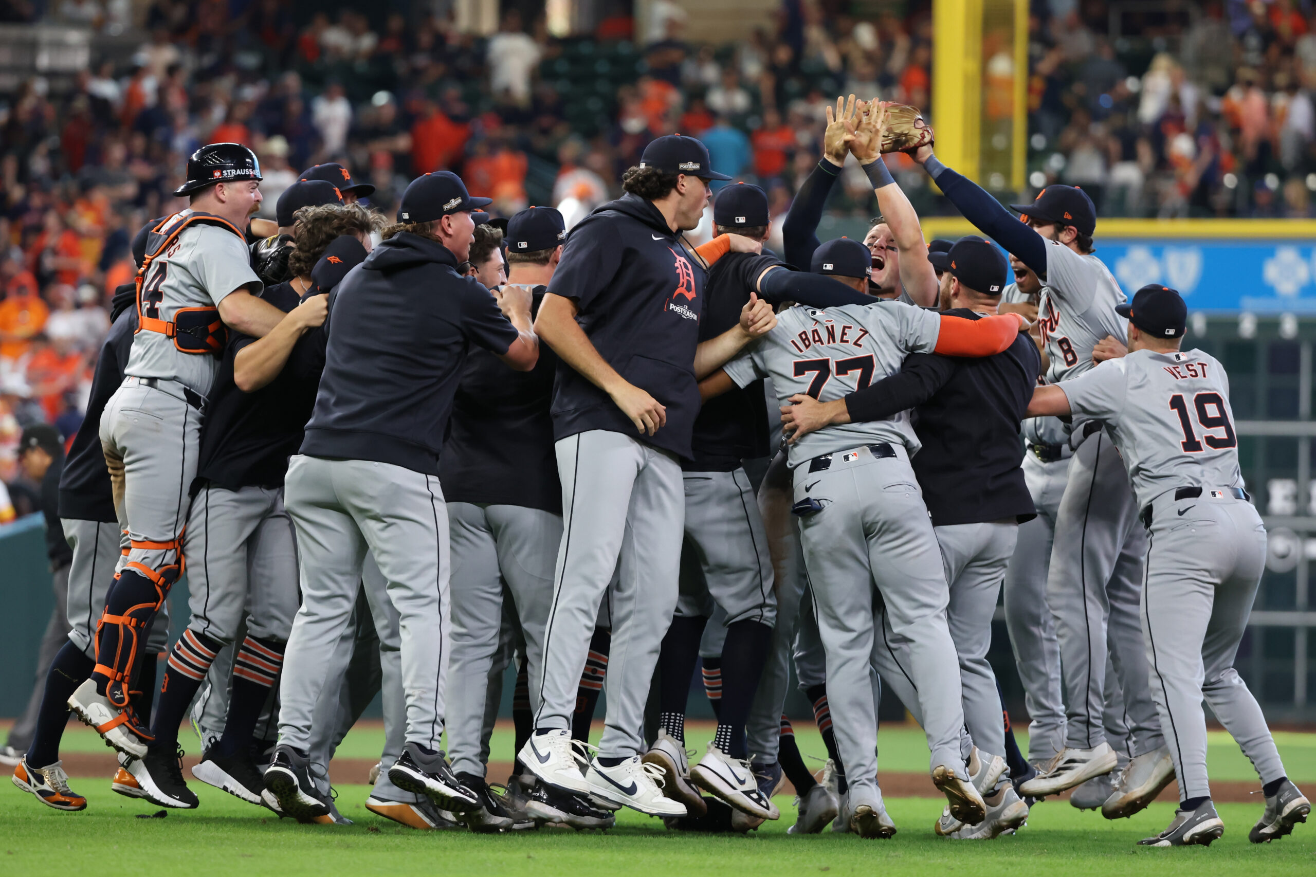 Oct 2, 2024; Houston, Texas, USA; Members of the Detroit Tigers celebrate after defeating the Houston Astros in game two of the Wildcard round for the 2024 MLB Playoffs at Minute Maid Park.