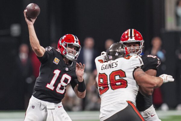 Oct 3, 2024; Atlanta, Georgia, USA; Atlanta Falcons quarterback Kirk Cousins (18) passes the ball against the Tampa Bay Buccaneers in the second half at Mercedes-Benz Stadium. Mandatory Credit: Dale Zanine-Imagn Images