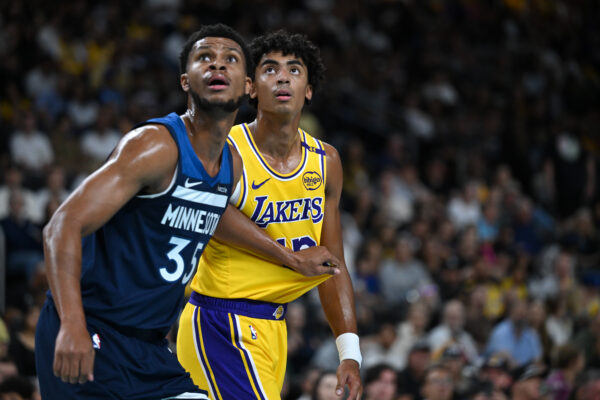 lOct 4, 2024; Palm Desert, California, USA; Minnesota Timberwolves guard PJ Dozier (35) and Los Angeles Lakers guard Max Christie (12) watch the free throw during the first half at Acrisure Arena.