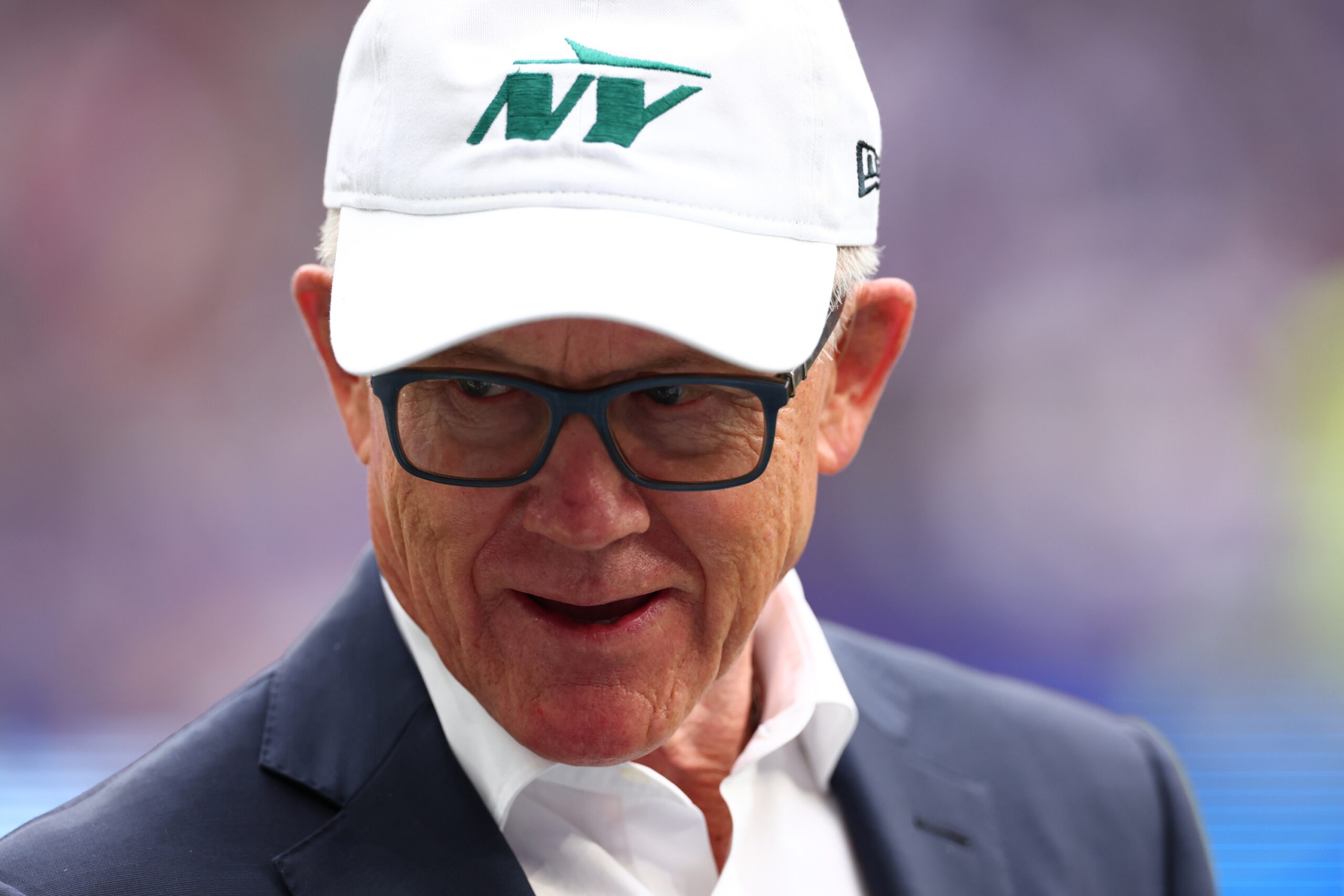 Oct 6, 2024; Tottenham, ENG; New York Jets owner Woody Johnson is pitch side before kick off against the Minnesota Vikings at Tottenham Hotspur Stadium. Mandatory Credit: Shaun Brooks-Imagn Images