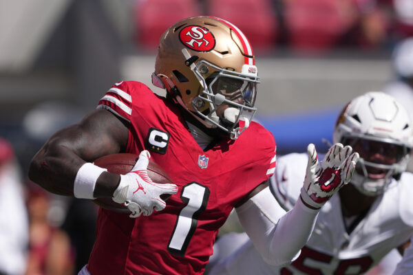 Oct 6, 2024; Santa Clara, California, USA; San Francisco 49ers wide receiver Deebo Samuel Sr. (1) carries the ball against the Arizona Cardinals during the first quarter at Levi's Stadium. Mandatory Credit: Darren Yamashita-Imagn Images