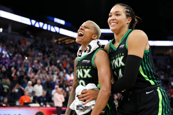 Oct 8, 2024; Minneapolis, Minnesota, USA; Minnesota Lynx guard Courtney Williams (10) and forward Napheesa Collier (24) celebrate their teams win after game five of the 2024 WNBA playoffs against the Connecticut Sun at Target Center.