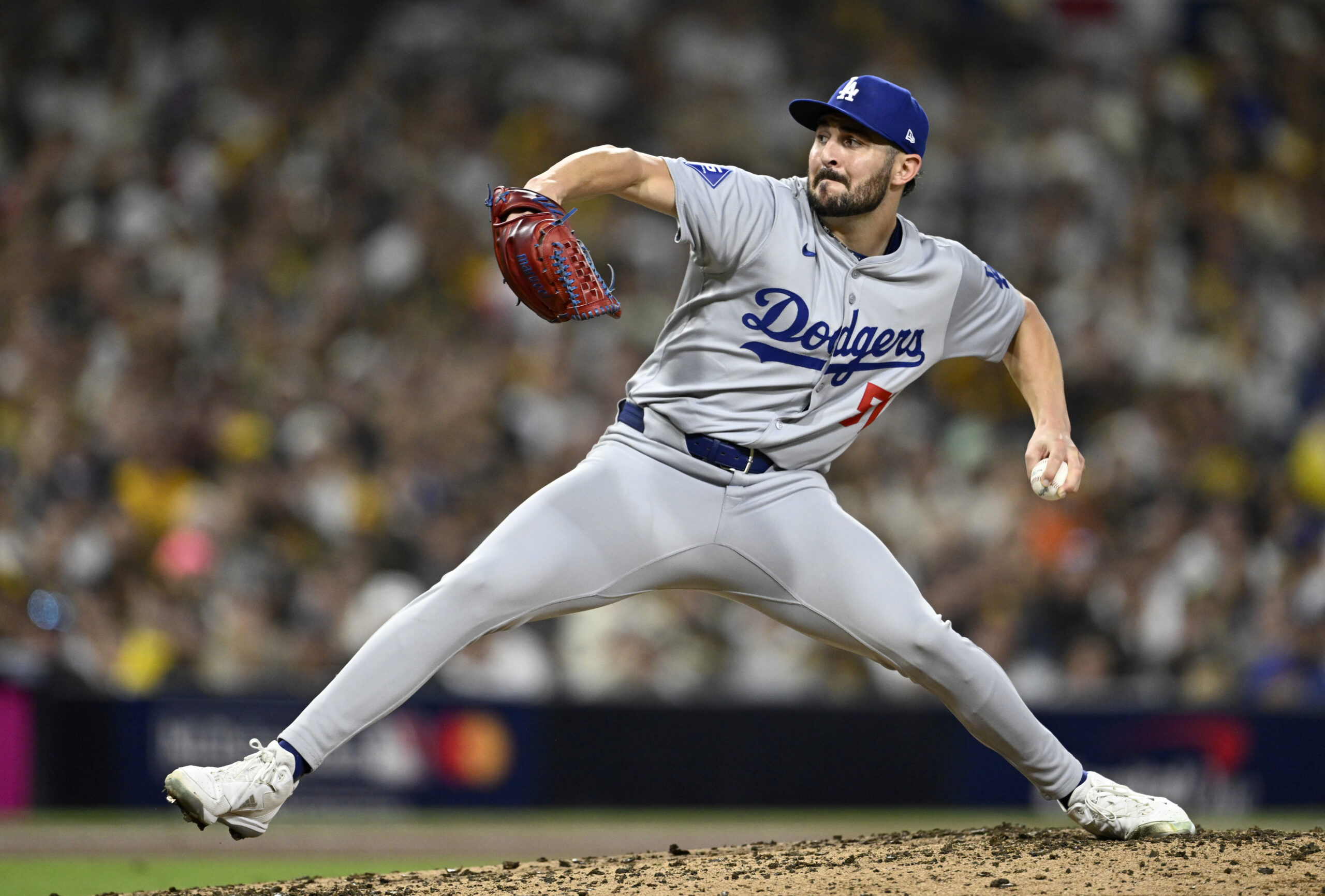 Oct 9, 2024; San Diego, California, USA; Los Angeles Dodgers pitcher Alex Vesia (51) throws in the fourth inning against the San Diego Padres during game four of the NLDS for the 2024 MLB Playoffs at Petco Park.