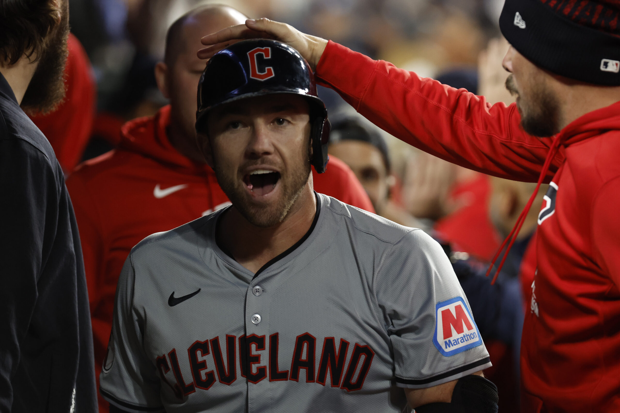 Oct 10, 2024; Detroit, Michigan, USA; Cleveland Guardians first base David Fry (6) celebrates in the dugout after hitting a two run home run in the seventh inning against the Detroit Tigers during game four of the ALDS for the 2024 MLB Playoffs at Comerica Park.