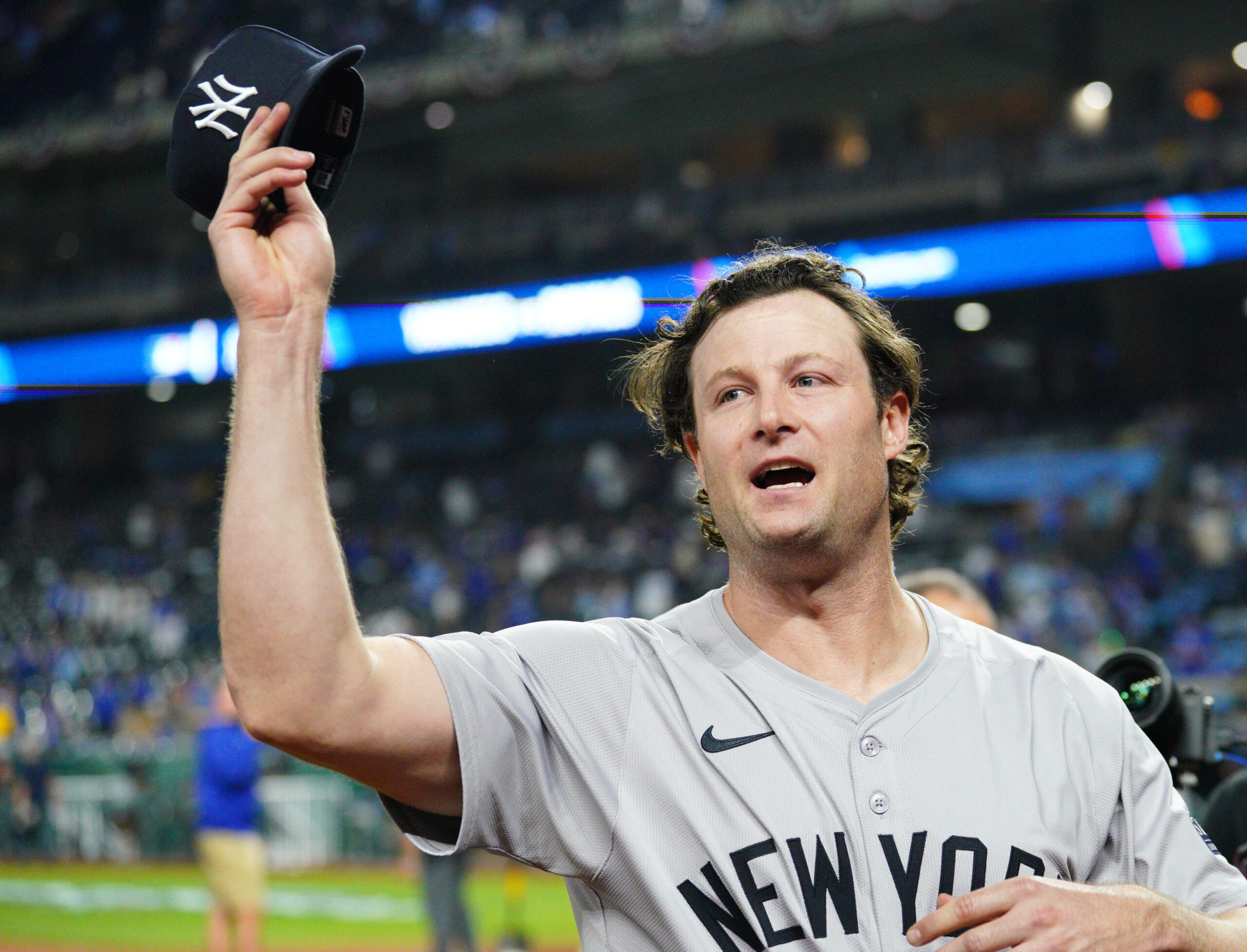 New York Yankees pitcher Gerrit Cole (45) waves to fans following a win over the Kansas City Royals during game four of the ALDS for the 2024 MLB Playoffs at Kauffman Stadium