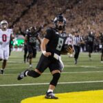 Oregon quarterback Dillon Gabriel scores a touchdown against Ohio State in the fourth quarter at Autzen Stadium Saturday, Oct. 12, 2024. Syndication: The Register Guard