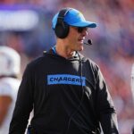 Oct 13, 2024; Denver, Colorado, USA; Los Angeles Chargers head coach Jim Harbaugh walks the sidelines n the second half against the Denver Broncos at Empower Field at Mile High. Mandatory Credit: Ron Chenoy-Imagn Images