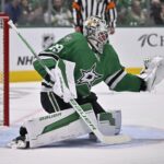 Oct 15, 2024; Dallas, Texas, USA; Dallas Stars goaltender Jake Oettinger (29) makes a glove save during the first period against the San Jose Sharks at the American Airlines Center. Mandatory Credit: Jerome Miron-Imagn Images