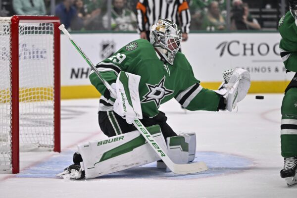 Oct 15, 2024; Dallas, Texas, USA; Dallas Stars goaltender Jake Oettinger (29) makes a glove save during the first period against the San Jose Sharks at the American Airlines Center. Mandatory Credit: Jerome Miron-Imagn Images