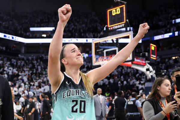 Oct 16, 2024; Minneapolis, Minnesota, USA; New York Liberty guard Sabrina Ionescu (20) celebrates her teams win after game three of the 2024 NBA Finals against the Minnesota Lynx at Target Center.