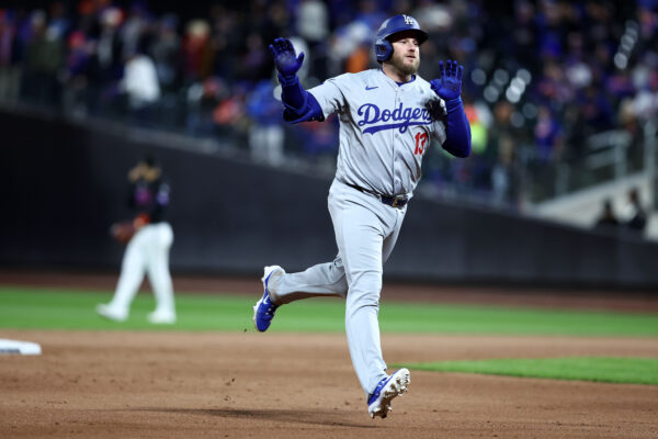 Oct 16, 2024; New York City, New York, USA; Los Angeles Dodgers third base Max Muncy (13) reacts after hitting a home run against the New York Mets in the ninth inning during game three of the NLCS for the 2024 MLB playoffs at Citi Field. Mandatory Credit: Wendell Cruz-Imagn Images