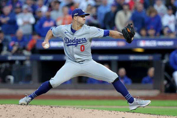 Oct 18, 2024; New York City, New York, USA; Los Angeles Dodgers starting pitcher Jack Flaherty (0) pitches against the New York Mets during the second inning of game five of the NLCS during the 2024 MLB playoffs at Citi Field. Mandatory Credit: Brad Penner-Imagn Images