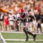 NCAA Football: Georgia at Texas. Oct 19, 2024; Austin, Texas, USA; Georgia Bulldogs wide receiver Dillon Bell (86) runs after a catch against the Texas Longhorns in the third quarter at Darrell K Royal-Texas Memorial Stadium. Mandatory Credit: Brett Patzke-Imagn Images