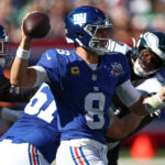 Oct 20, 2024; East Rutherford, New Jersey, USA; New York Giants quarterback Daniel Jones (8) throws the ball during the first half against the Philadelphia Eagles at MetLife Stadium. Mandatory Credit: Vincent Carchietta-Imagn Images