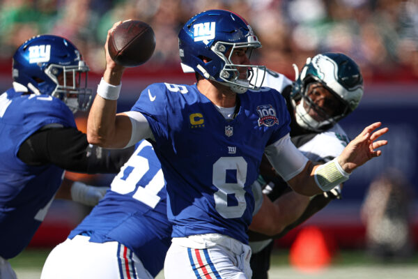 Oct 20, 2024; East Rutherford, New Jersey, USA; New York Giants quarterback Daniel Jones (8) throws the ball during the first half against the Philadelphia Eagles at MetLife Stadium. Mandatory Credit: Vincent Carchietta-Imagn Images