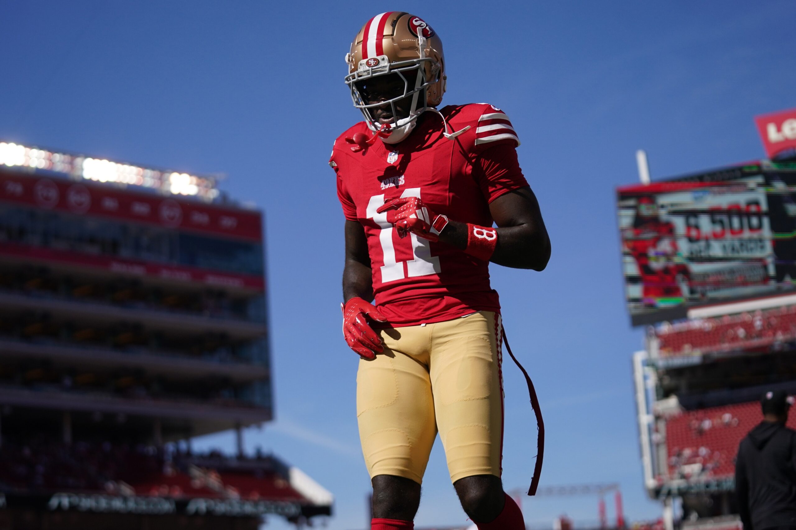 Oct 20, 2024; Santa Clara, California, USA; San Francisco 49ers wide receiver Brandon Aiyuk (11) walks on the field before the start of the game against the Kansas City Chiefs at Levi's Stadium.