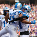 Oct 20, 2024; Minneapolis, Minnesota, USA; Detroit Lions wide receiver Kalif Raymond (11) celebrates his touchdown against the Minnesota Vikings during the third quarter at U.S. Bank Stadium