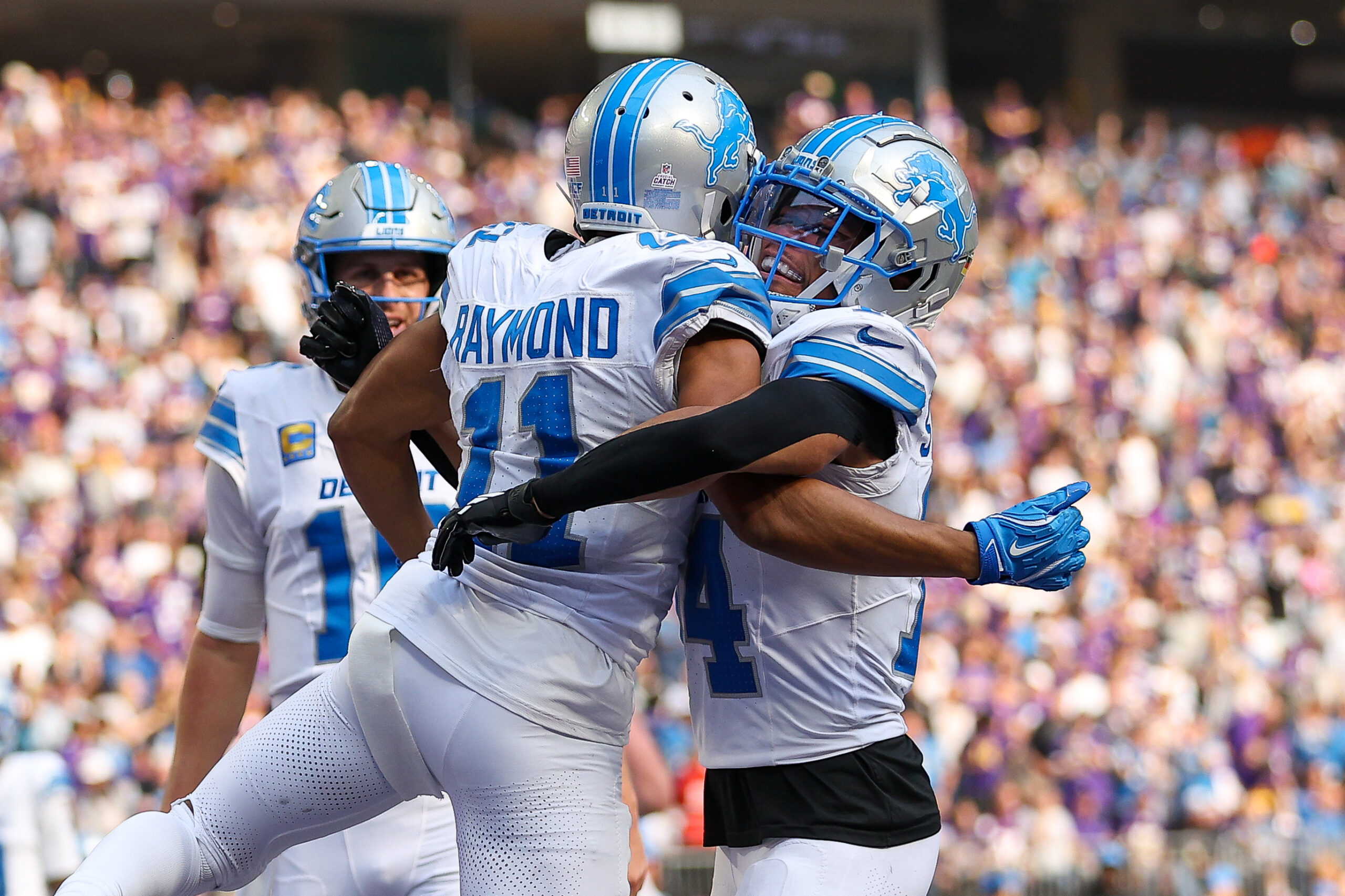 Oct 20, 2024; Minneapolis, Minnesota, USA; Detroit Lions wide receiver Kalif Raymond (11) celebrates his touchdown against the Minnesota Vikings during the third quarter at U.S. Bank Stadium