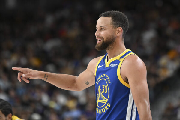 Oct 15, 2024; Las Vegas, Nevada, USA; Golden State Warriors guard Stephen Curry (30) on court against the Los Angeles Lakers in the third quarter during a preseason game at T-Mobile Arena.