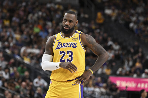 Oct 15, 2024; Las Vegas, Nevada, USA; Los Angeles Lakers forward LeBron James (23) looks on against the Golden State Warriors in the first quarter during a NBA preseason game at T-Mobile Arena.