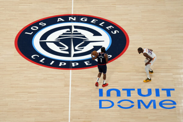 Oct 23, 2024; Inglewood, California, USA; A general overall view as LA Clippers guard James Harden (1) dribbles the ball against Phoenix Suns forward Kevin Durant (35) on the Clippers logo at midcourt at Intuit Dome.