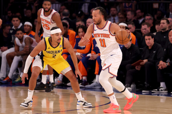 Oct 25, 2024; New York, New York, USA; New York Knicks guard Jalen Brunson (11) controls the ball against Indiana Pacers guard Andrew Nembhard (2) during the first quarter at Madison Square Garden.