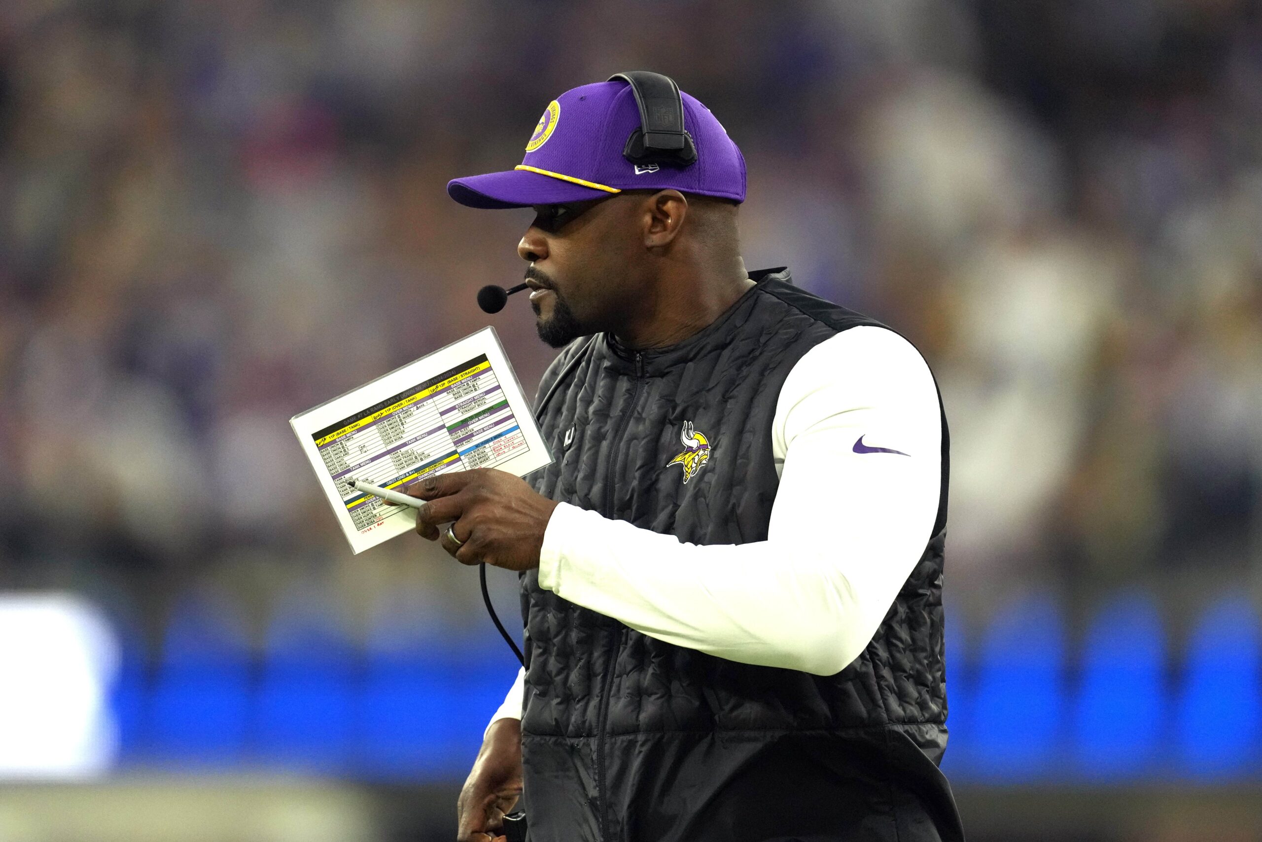 Oct 24, 2024; Inglewood, California, USA; Minnesota Vikings defensive coordinator Brian Flores watches from the sidelines against the Los Angeles Rams in the first half at SoFi Stadium. Mandatory