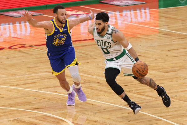 Jun 16, 2022; Boston, Massachusetts, USA; NBA; Boston Celtics forward Jayson Tatum (0) dribbles the ball against Golden State Warriors guard Stephen Curry (30) during the second quarter of game six in the 2022 NBA Finals at the TD Garden.