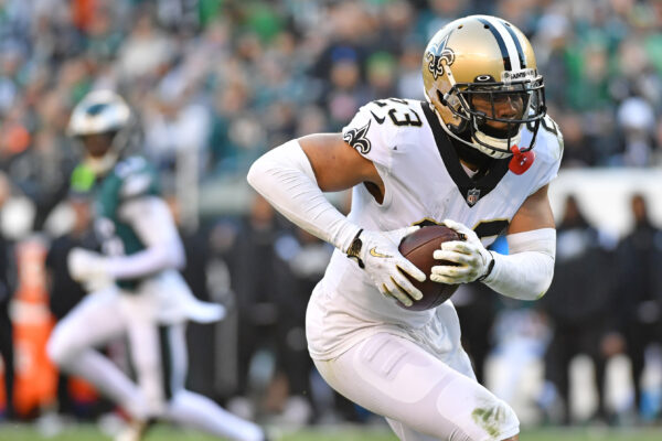 Jan 1, 2023; Philadelphia, Pennsylvania, USA; New Orleans Saints cornerback Marshon Lattimore (23) runs with the football after intercepting a pass against the Philadelphia Eagles at Lincoln Financial Field. Mandatory Credit: Eric Hartline-Imagn Images