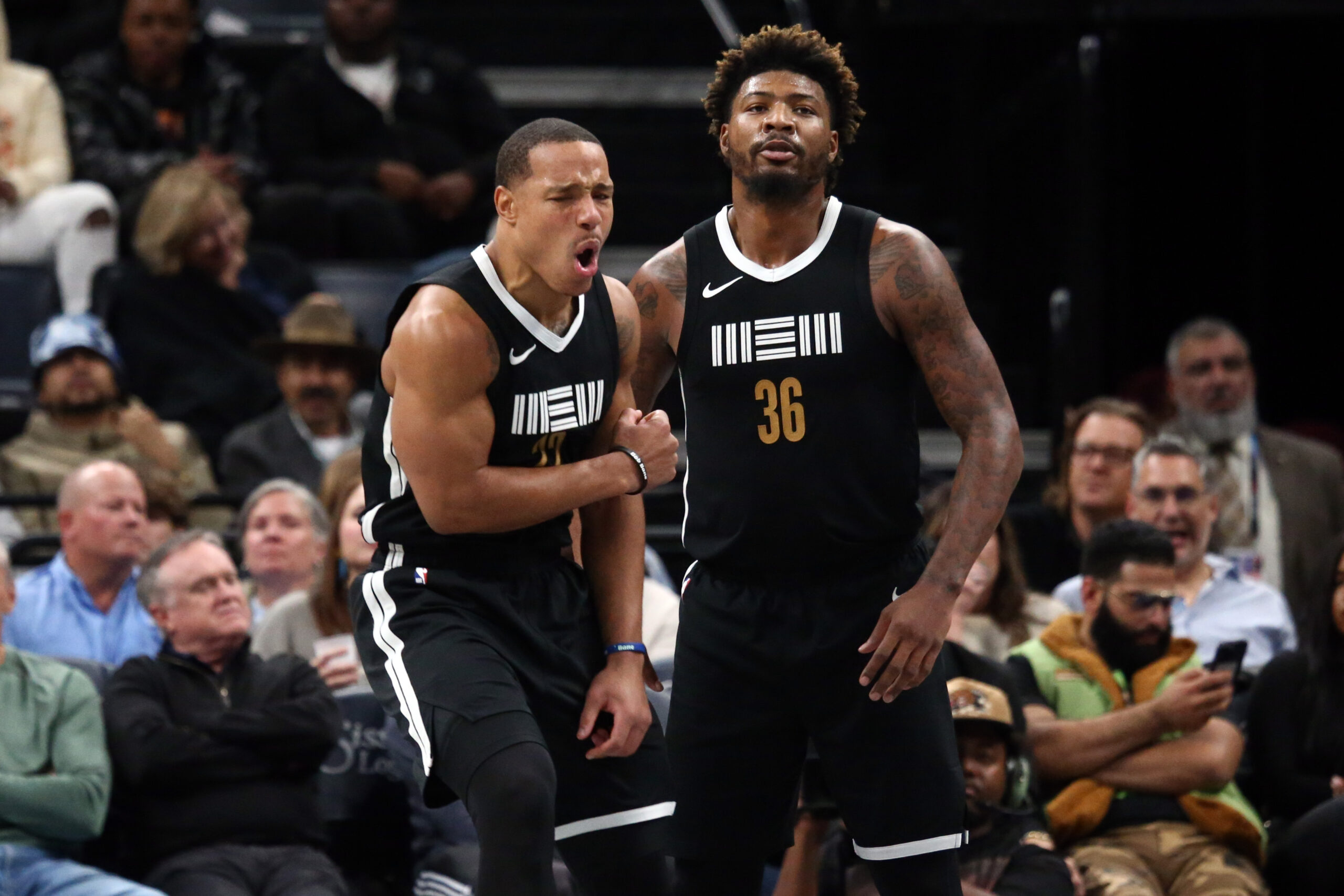 Nov 10, 2023; Memphis, Tennessee, USA; Memphis Grizzlies guards Desmond Bane (22) and Marcus Smart (36) react during the first half against the Utah Jazz at FedExForum.