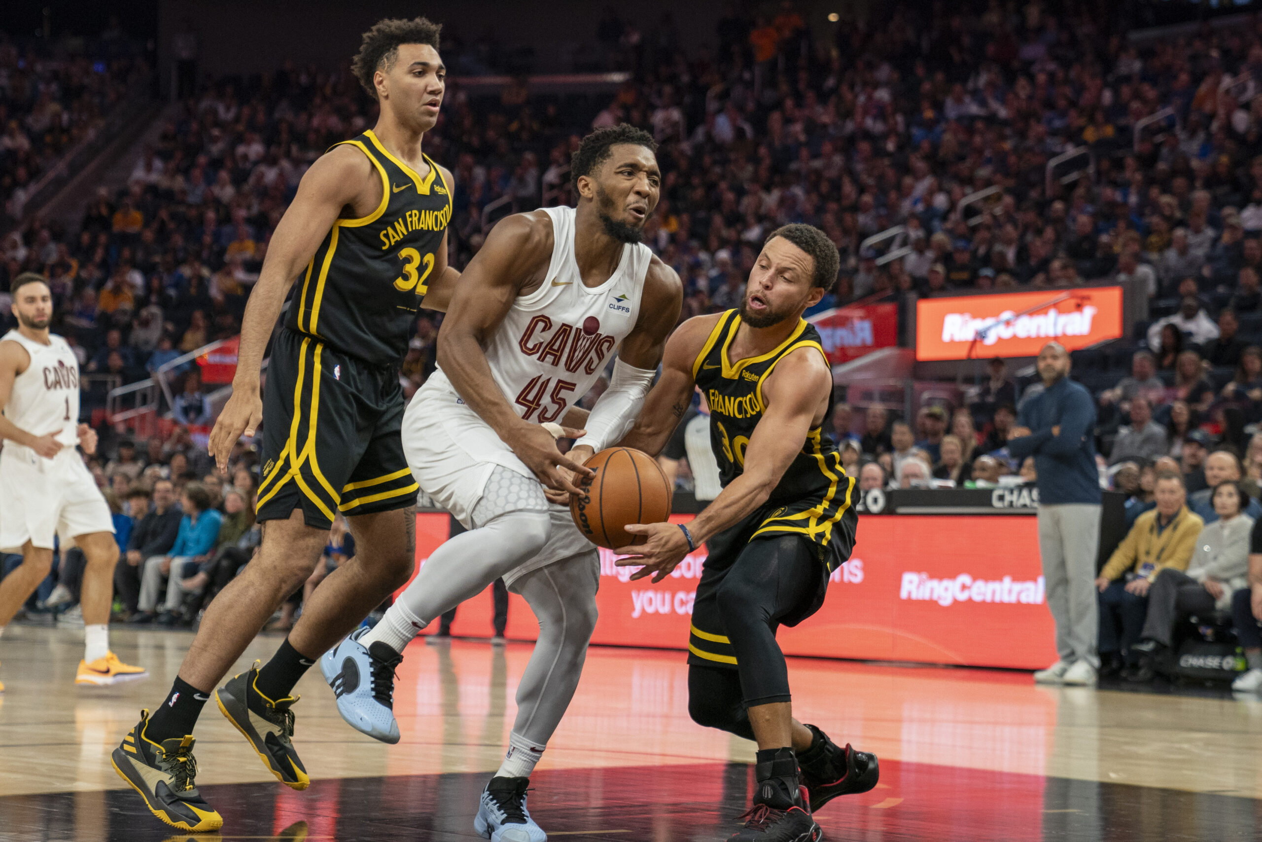 Nov 11, 2023; San Francisco, California, USA; Golden State Warriors guard Stephen Curry (30) steals the basketball from Cleveland Cavaliers guard Donovan Mitchell (45) during the second quarter at Chase Center.