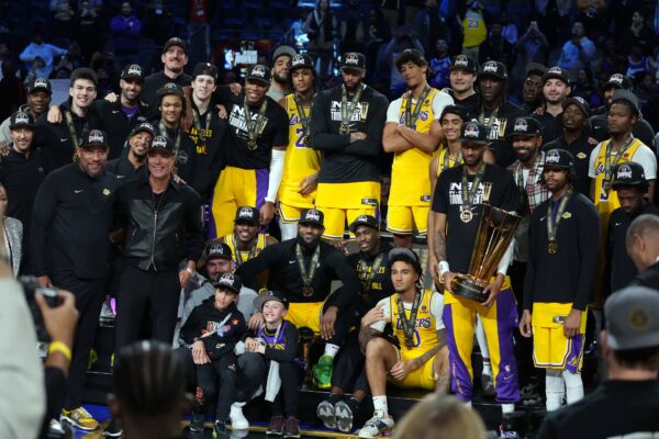 Dec 9, 2023; Las Vegas, Nevada, USA; The Los Angeles Lakers pose on the podium after defeating the Indiana Pacers in the in season tournament championship final at T-Mobile Arena. Mandatory Credit: Kyle Terada-USA TODAY Sports