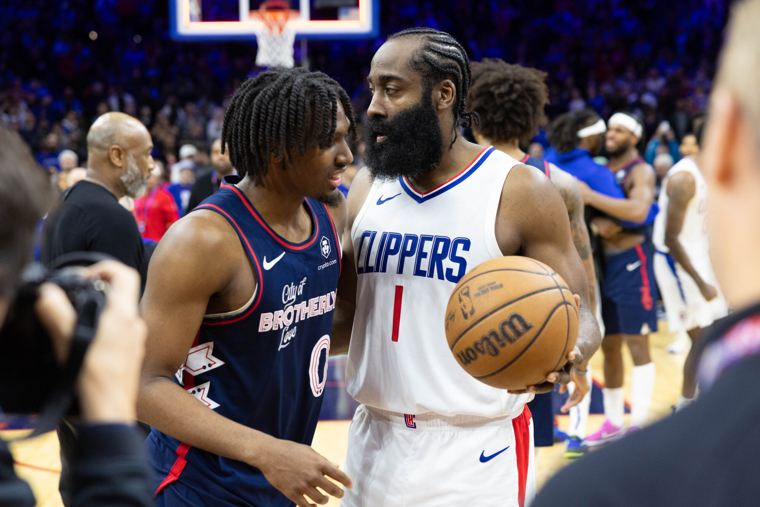 Mar 27, 2024; Philadelphia, Pennsylvania, USA; LA Clippers guard James Harden (1) and Philadelphia 76ers guard Tyrese Maxey (0) talk after the game at Wells Fargo Center