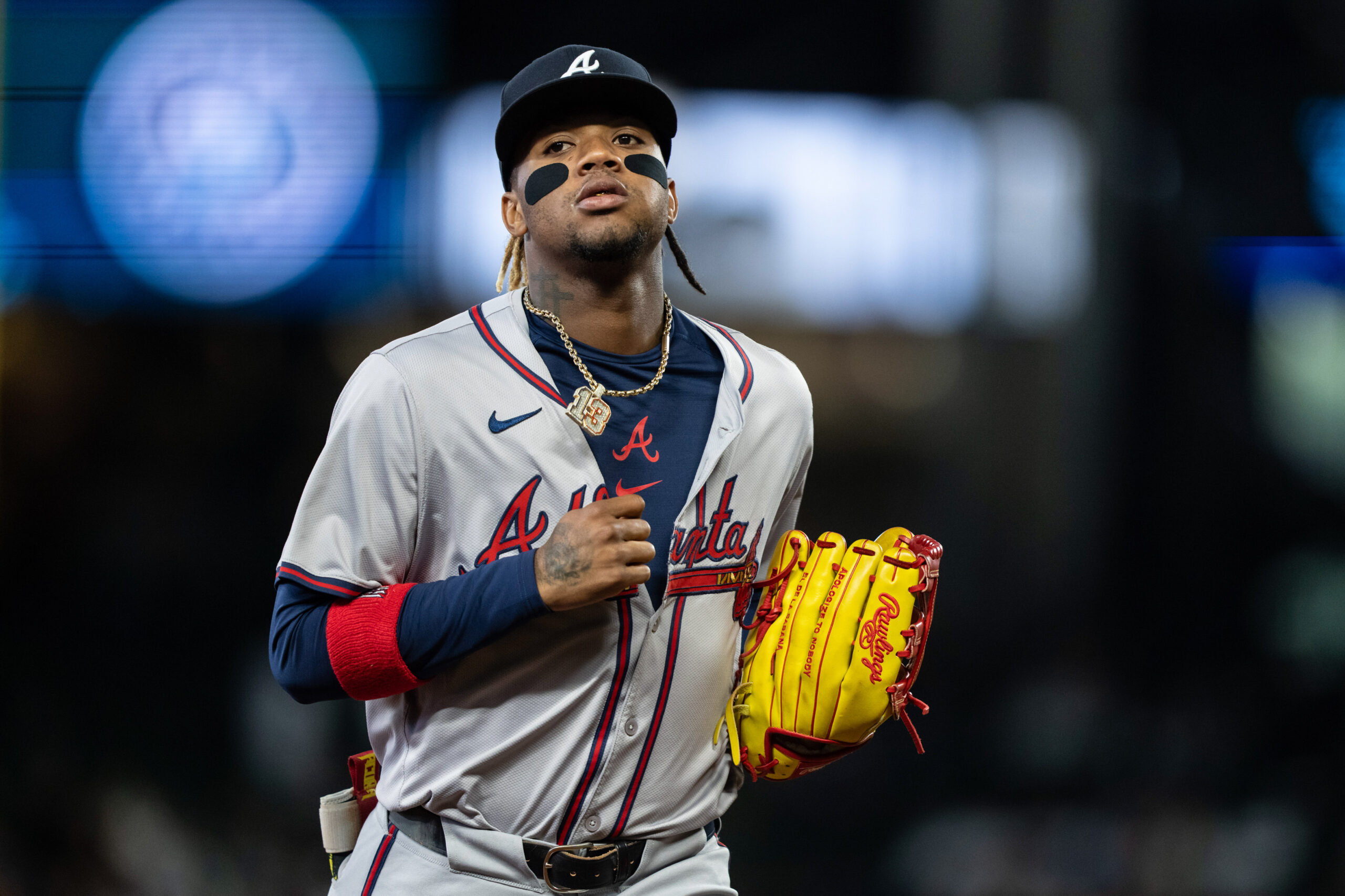 Apr 29, 2024; Seattle, Washington, USA; Atlanta Braves right fielder Ronald Acuna Jr. (13) jogs off the field during a game against the Seattle Mariners at T-Mobile Park. Mandatory Credit: Stephen Brashear-USA TODAY Sports