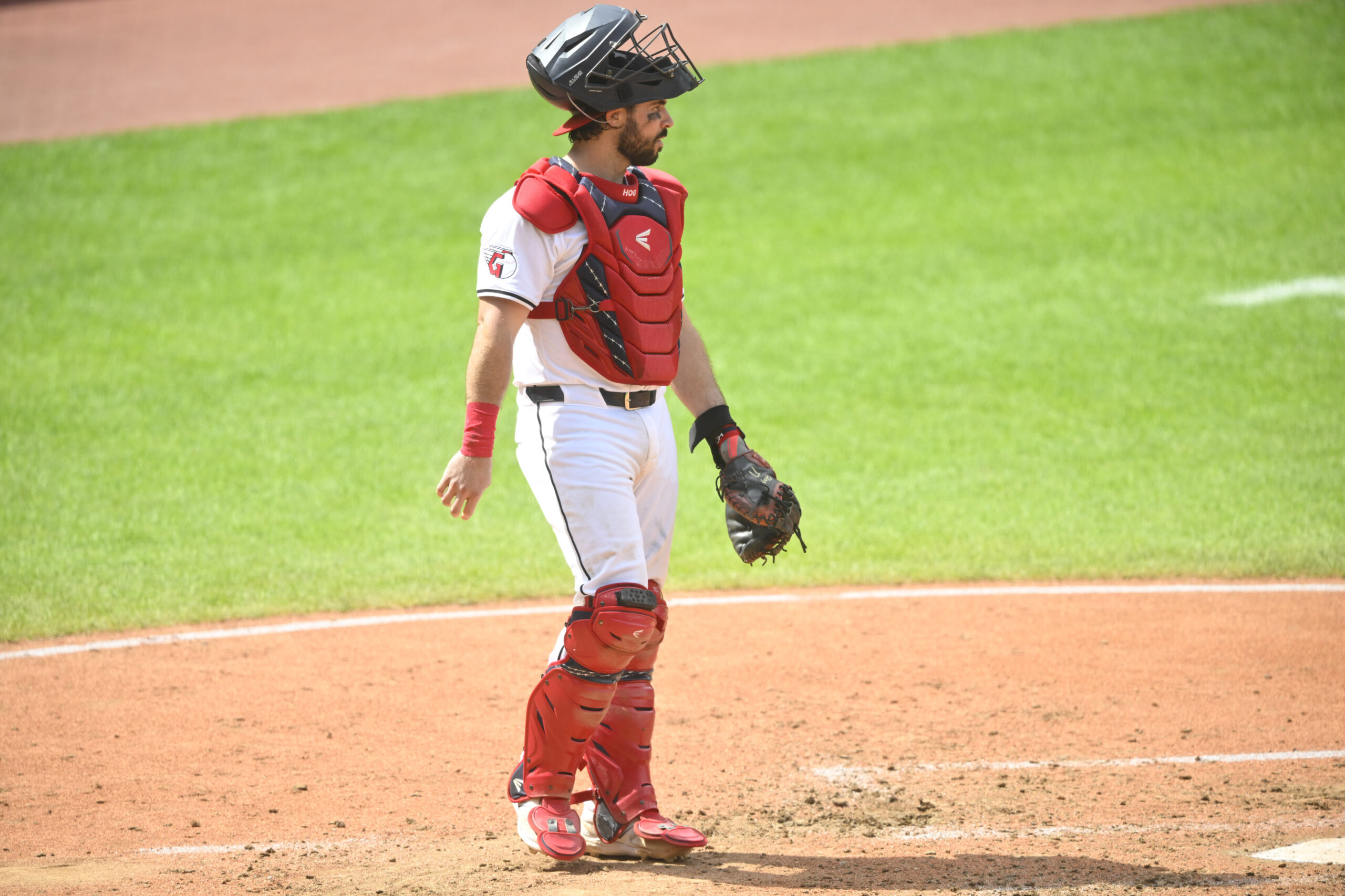 Sep 1, 2024; Cleveland, Ohio, USA; Cleveland Guardians catcher Austin Hedges (27) stands on the field in the sixth inning against the Pittsburgh Pirates at Progressive Field. Mandatory Credit: David Richard-USA TODAY Sports