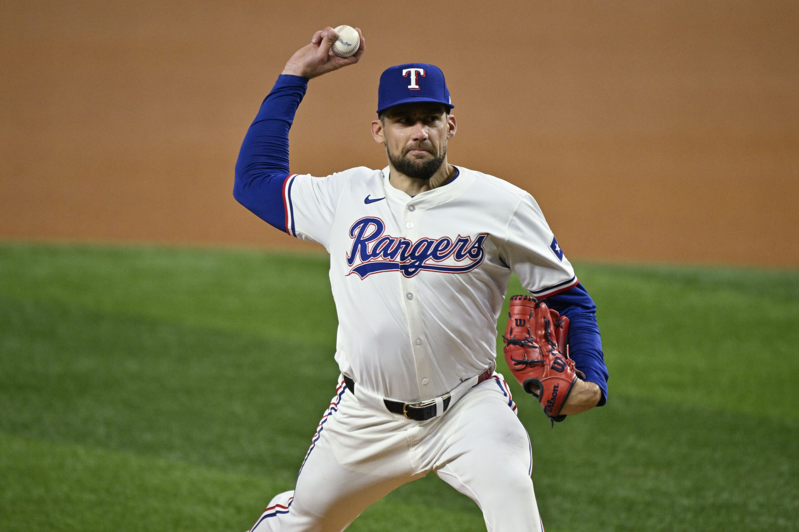 Sep 17, 2024; Arlington, Texas, USA; Texas Rangers starting pitcher Nathan Eovaldi (17) pitches against the Toronto Blue Jays during the first inning at Globe Life Field. Mandatory Credit: Jerome Miron-Imagn Images