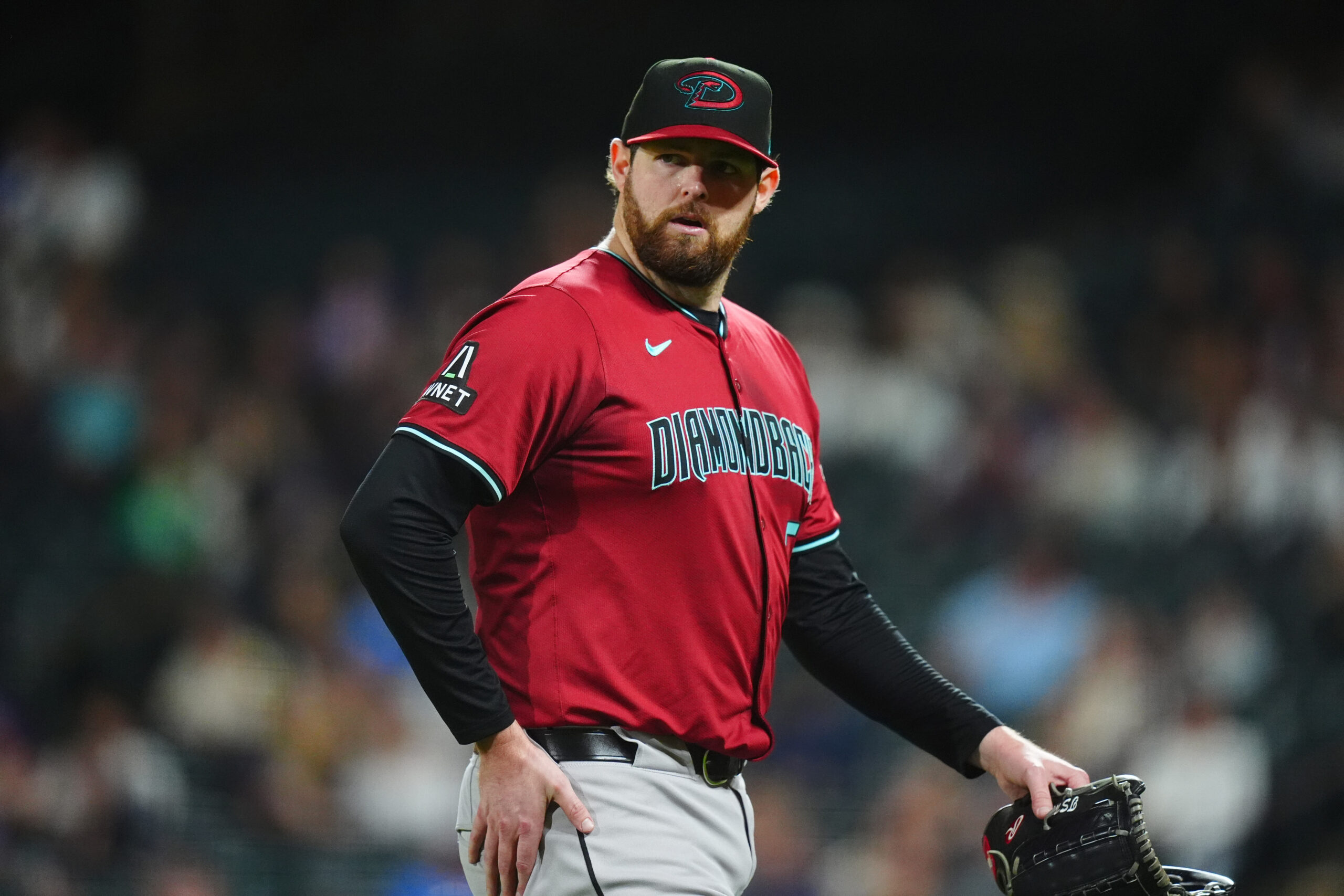 Sep 17, 2024; Denver, Colorado, USA; Arizona Diamondbacks starting pitcher Jordan Montgomery (52) leaves the mound in the fifth inning against the Colorado Rockies at Coors Field. Mandatory Credit: Ron Chenoy-Imagn Images