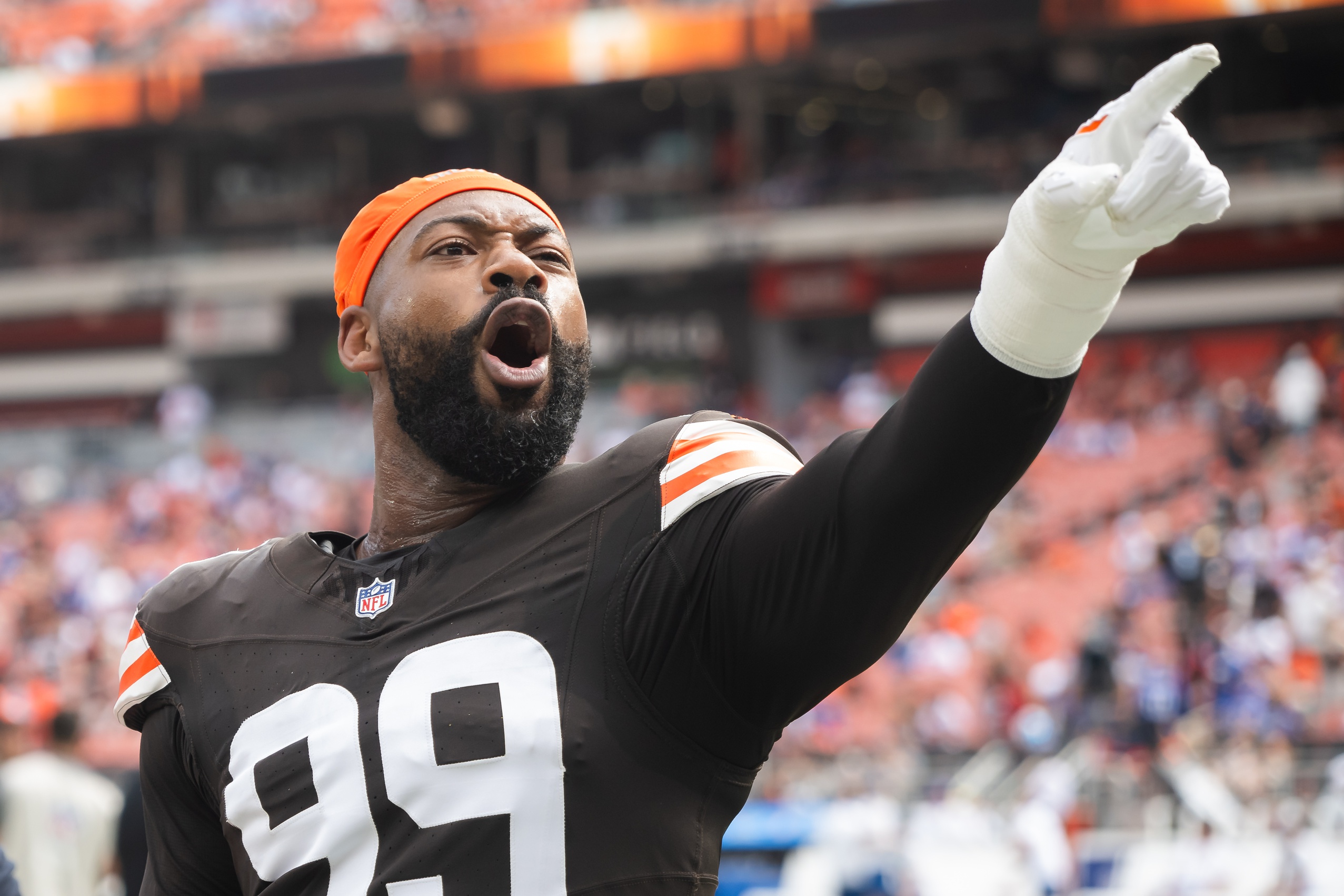 Sep 22, 2024; Cleveland, Ohio, USA; Cleveland Browns defensive end Za'Darius Smith (99) reacts to fans before the game between the Browns and the New York Giants at Huntington Bank Field. Mandatory Credit: Ken Blaze-Imagn Images