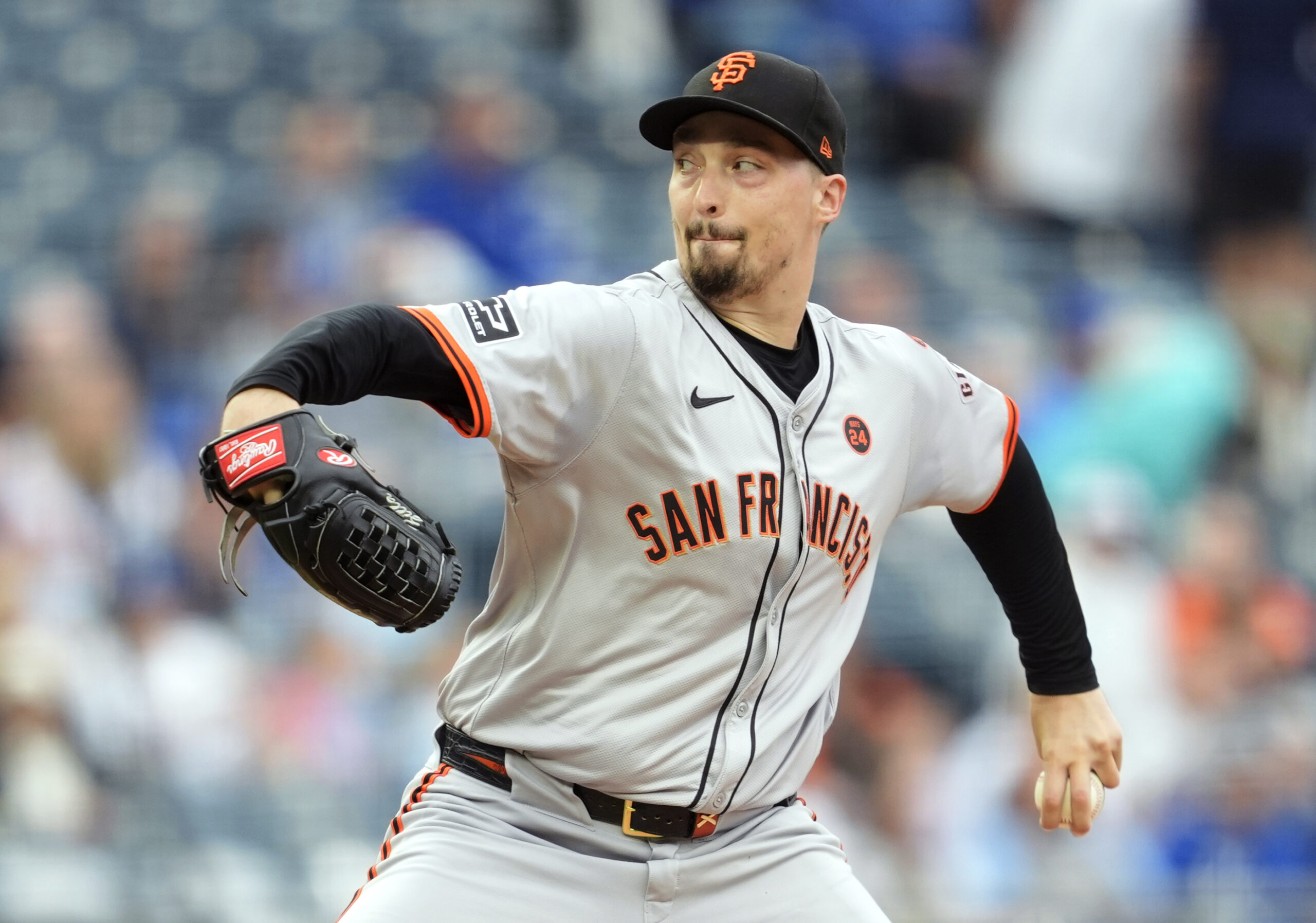 Sep 22, 2024; Kansas City, Missouri, USA; San Francisco Giants starting pitcher Blake Snell (7) pitches during the first inning against the Kansas City Royals at Kauffman Stadium.