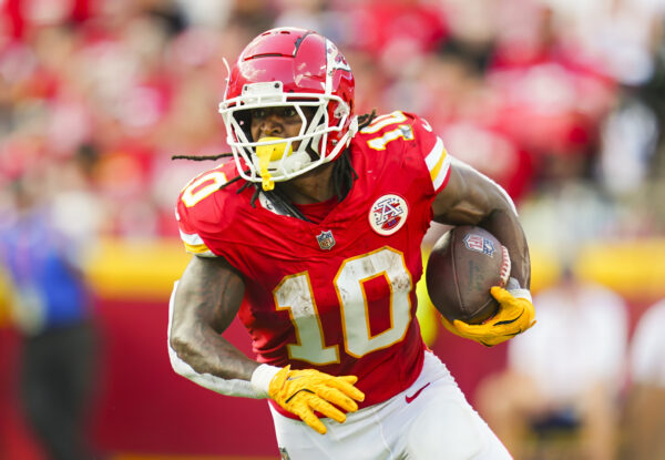 Sep 15, 2024; Kansas City, Missouri, USA; Kansas City Chiefs running back Isiah Pacheco (10) runs the ball during the first half against the Cincinnati Bengals at GEHA Field at Arrowhead Stadium.