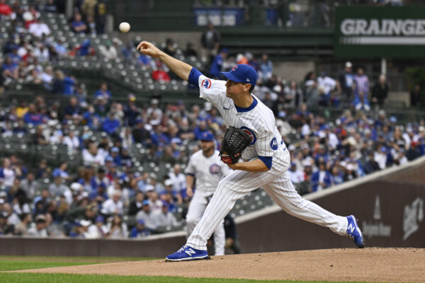 Sep 28, 2024; Chicago, Illinois, USA; Chicago Cubs pitcher Kyle Hendricks (28) delivers against the Cincinnati Reds during the first inning at Wrigley Field. Mandatory Credit: Matt Marton-Imagn Images