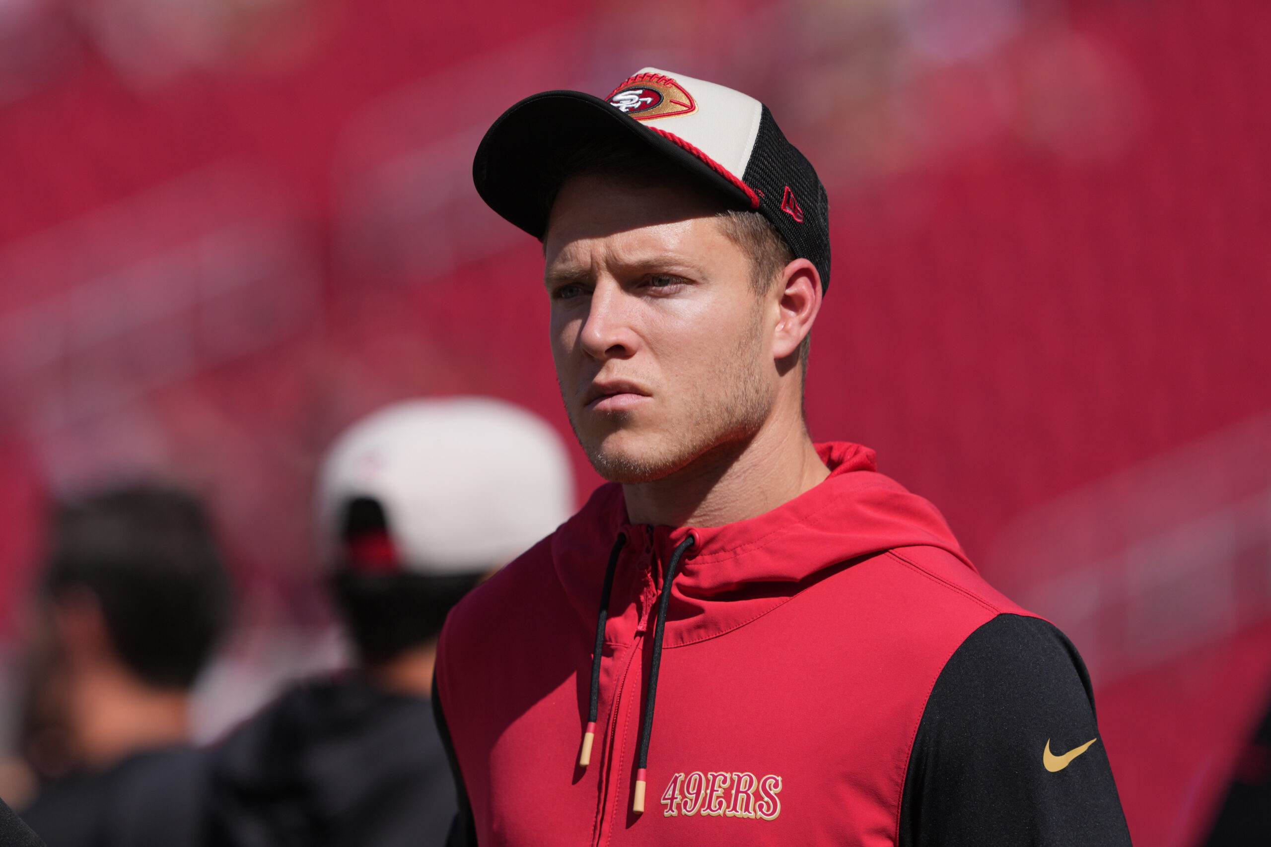 Oct 6, 2024; Santa Clara, California, USA; San Francisco 49ers running back Christian McCaffrey (23) walks on the field before the game against the Arizona Cardinals at Levi's Stadium. Mandatory Credit: Darren Yamashita-Imagn Images