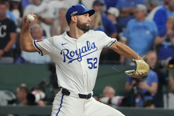 Oct 10, 2024; Kansas City, Missouri, USA; Kansas City Royals pitcher Michael Wacha (52) throws during the first inning against the New York Yankees during game four of the ALDS for the 2024 MLB Playoffs at Kauffman Stadium. Mandatory Credit: Denny Medley-Imagn Images