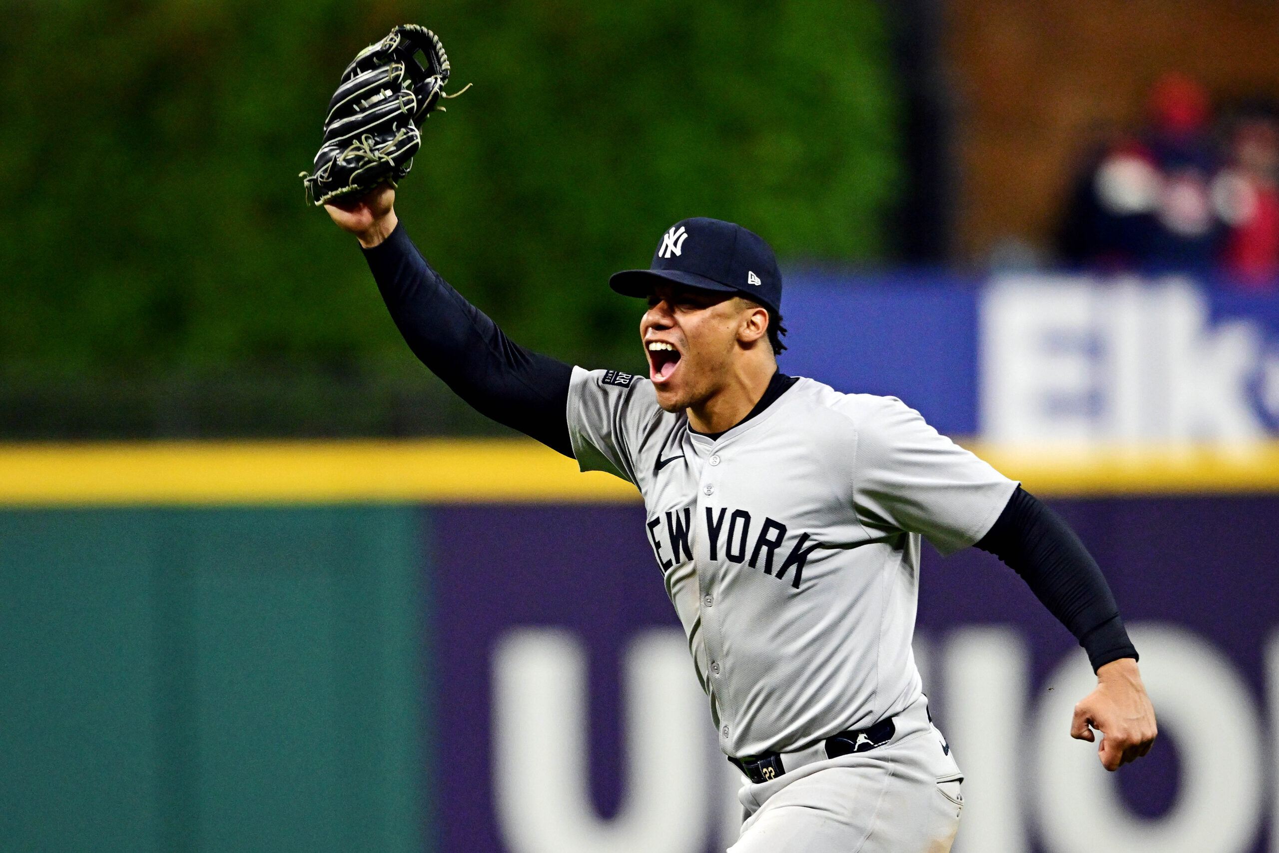 Oct 19, 2024; Cleveland, Ohio, USA; New York Yankees outfielder Juan Soto (22) celebrates after making the final out to beat the Cleveland Guardians during game five of the ALCS for the 2024 MLB playoffs at Progressive Field. Mandatory Credit: David Dermer-Imagn Images